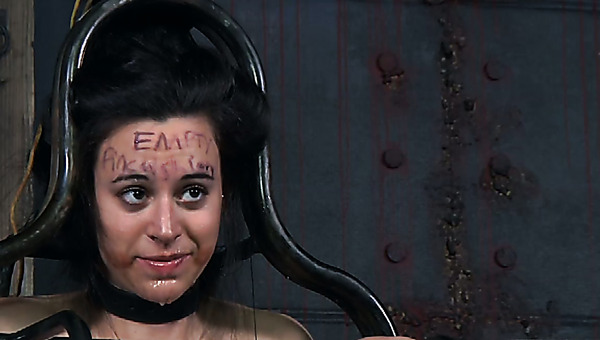 Chubby dark haired teen gets her body fastened in metal cage during BDSM sex play