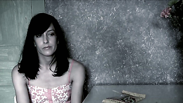 Tired looking brunette slut gets her slender frame suspended face down