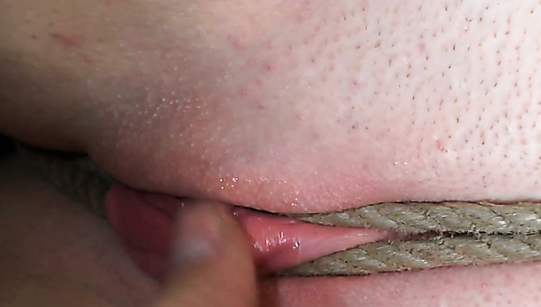 Svelte blond cutie gets her slender body bandaged as she lies on the couch