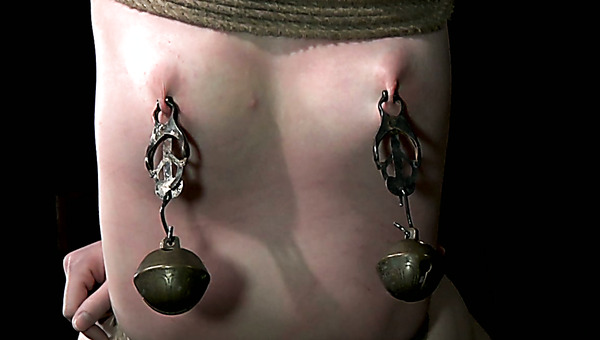 Sizzling blond teen gets her naked body hanged with nipples pined with pegs