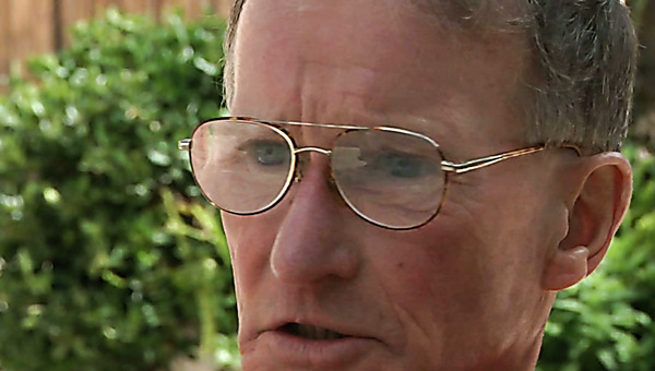 Appetizing red-haired cutie rubs weak hard penis of grey-haired dude with her hand