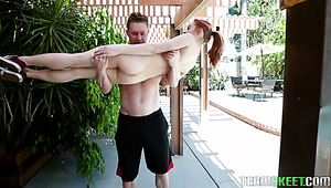 Extremely flexible pale redhead Kandi Quinn is pounded from behind hard