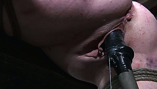 Busty brunette chick is tied and suspended in the air by her perverted mentor