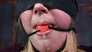 Poor blonde bitch with a star tattoo drooling herself in kinky bdsm play