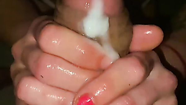 College girl rubs big cock with her oiled hands till massive ejaculation