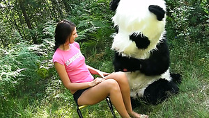 Playful brunette teen Molly undresses in front of guy in Panda costume