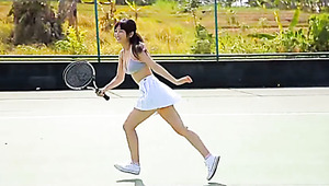 Sassy Asian girl Yuka Hirata plays tennis on the court