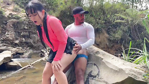 Cute Latin babe decided to publicly enjoy her best friend's dick while riding a bike.