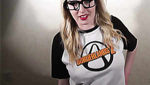 Lusty blonde gamer in glasses masturbates with joystick and a dildo