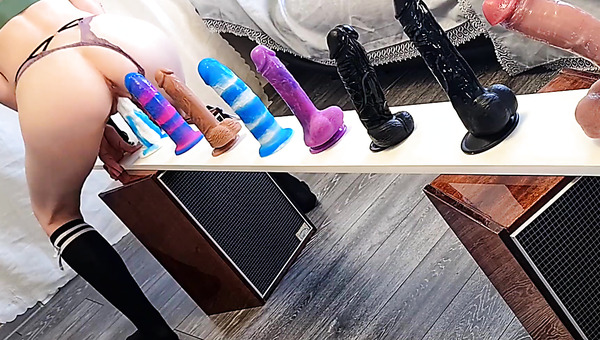 Sexy Plump-assed Babe Rides Different Dildos Put In a Row To Choose the Best One