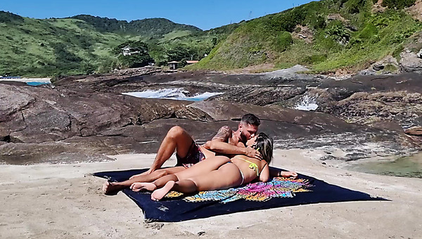 Naughty couple has some fun on the beach with no one around