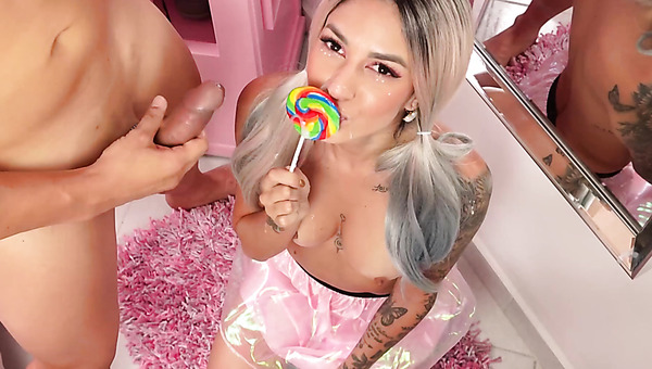 She was sucking a lollipop thinking of a real thing