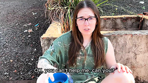 Street beggar girl getting help from the random guy and returns the favour