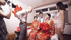 Sweet asian teen gets shared by two lustful guys in bed after the wedding