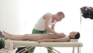 Enticing brunette chick  Artemida enjoys full  body massage