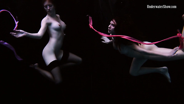 Stunning babe Andrejka does underwater gymnastics with her GF