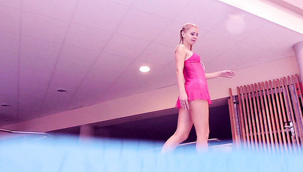 Lovely teen swimming naked in a pool in arousing sex tape