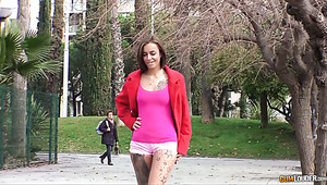 Sweet and sexy white redhead cutie in public place flashes her goodies