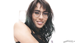 Naughty leggy nerdy brunette Janice Griffith exposes her booty before doggy