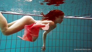 Underwater solo show of well swimming beauty with juicy tits Deniska